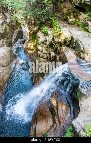 Sabbaday Falls waterfall in the White Mountain National Forest in New Hampshire, USA. The falls are a picturesque series of cascades in a narrow flume Stock Photo