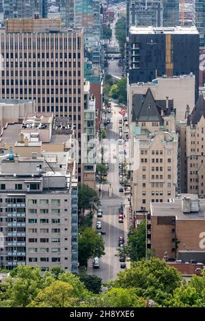 Montreal, Quebec, Canada – 14 August 2021 – View of the Montreal city downtown from the belvedere Kondiaronk of the Mont Royal park. Stock Photo