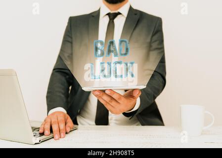 Conceptual caption Bad Luck. Word for an unfortunate state resulting from unfavorable outcomes Mischance Remote Office Work Online Smartphone Voice Stock Photo