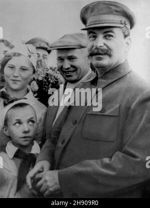 RUSSIA - circa 1938 - Nikita Krushchev and Joseph Stalin on a walkabout somewhere in the former USSR circa 1938 - Photo: Geopix Stock Photo