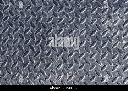Non-slip metal steel plates background. Stock Photo