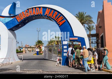 Hurghada, Egypt - May 31, 2021: People at the Hurghada marina entrance and exit. Touristic destination, a lively place to explore. Stock Photo