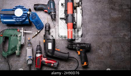 Electric Hand Power Tools In Repair Workshop Stock Photo