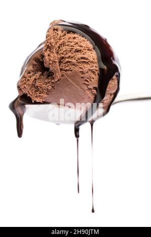 A spoon full of chocolate ice cream isolated on white background Stock Photo