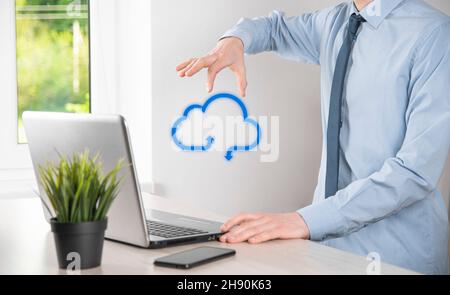 Business man holding icon cloud computing network and icon connection data information in hand. Cloud computing and technology concept Stock Photo