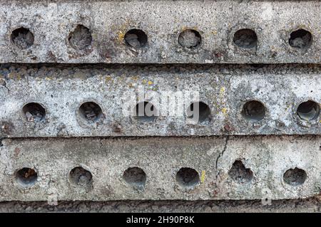Concrete floor slabs with round voids. Element of residential construction. Building materials in a stack Stock Photo