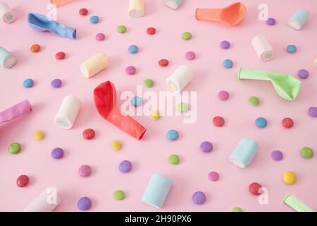 Halloween balloon, marshmallow and candy pattern on pastel pink background. Sweet junk food concept. Flat lay. Stock Photo