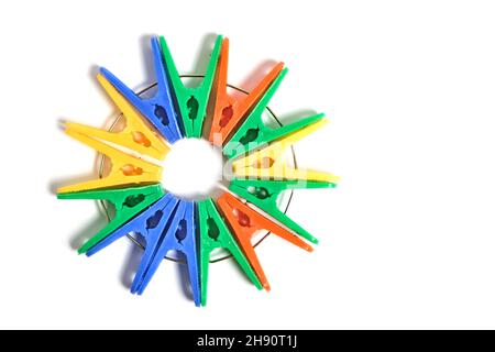 Multicolored clothespins on a white background, isolate Stock Photo
