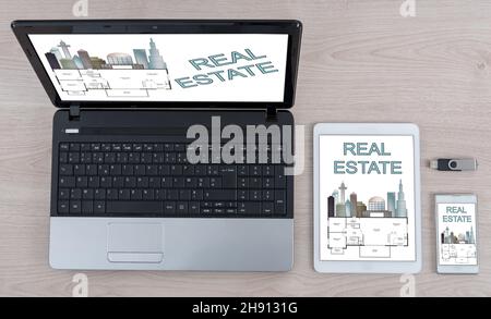 Real estate concept shown on different information technology devices Stock Photo