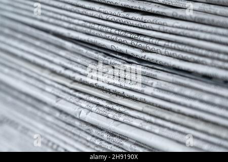 Dresden, Germany. 01st Dec, 2021. ILLUSTRATION - A stack of various daily newspapers lies on a table. Credit: Sebastian Kahnert/dpa-Zentralbild/ZB/dpa/Ģ����ý Live News Stock Photo