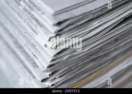 Dresden, Germany. 01st Dec, 2021. ILLUSTRATION - A stack of various daily newspapers lies on a table. Credit: Sebastian Kahnert/dpa-Zentralbild/ZB/dpa/Ģ����ý Live News Stock Photo