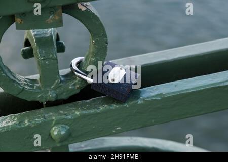 Closed lock on the bridge close up. Stock Photo