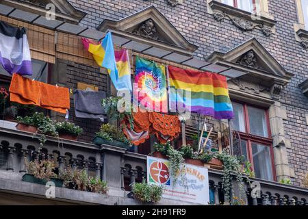 Budapest, Hungary - 1 November 2021: LGBT flag hanging on the balcony, Illustrative Editorial. Stock Photo