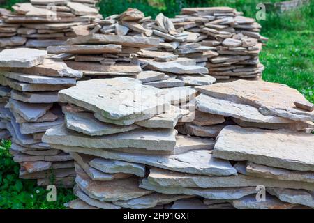 Quarrystone in a pile . Stacked natural stones Stock Photo