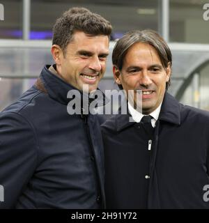 Milan, Italy. 01st Dec, 2021. Italy, Milan, dec 1 2021: Thiago Motta (Spezia manager) and Simone Inzaghi (Inter manager) during football match FC INTER vs SPEZIA, Serie A 2021-2022 day15 at San Siro stadium (Photo by Fabrizio Andrea Bertani/Pacific Press) Credit: Pacific Press Media Production Corp./Alamy Live News Stock Photo