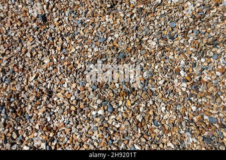 Gravel background of rock pebble stones used for landscaping and pathways in gardens with a nice texture pattern, stock photo image Stock Photo