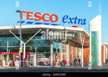 Tesco Extra Supermarket sign, Station Road, Addlestone, Surrey, England, United Kingdom Stock Photo