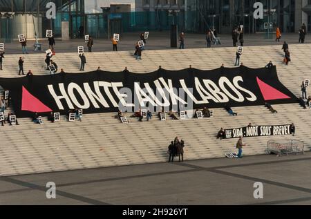 Paris, France, Group AIDS Activists of Act Up Paris, Action Against Big Pharma, in La Dé-fense Business Center, Protest Banner: 'Shame on Labos', AIDS: Deaths under Licence » Stock Photo