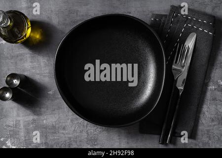 set of empty plates on the table. serving Stock Photo