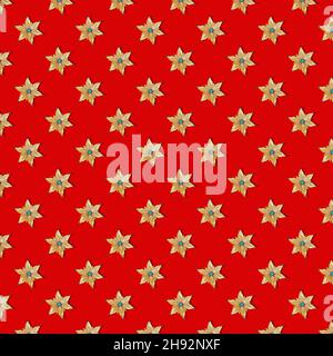 Seamless Christmas texture stars on a red background. Pattern. Stock Photo