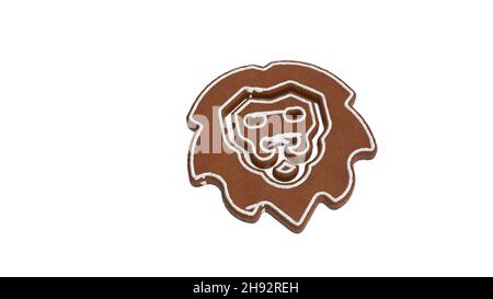 3d rendering of gingerbread cookie in shape of symbol of lion head wild animal isolated on white background with white icing Stock Photo