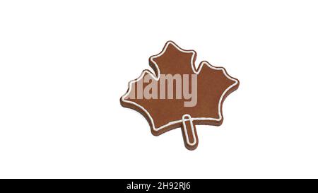 3d rendering of gingerbread cookie in shape of symbol of maple leaf plant isolated on white background with white icing Stock Photo