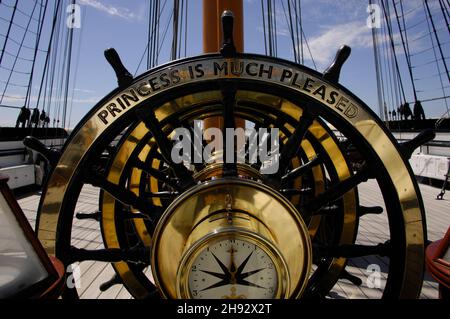 AJAXNETPHOTO. 4TH JUNE, 2015. PORTSMOUTH, ENGLAND. - HMS WARRIOR 1860 - FIRST AND LAST IRONCLAD WARSHIP OPEN TO THE PUBLIC. BRASS BOUND SHIP'S WHEELS INSCRIBED 'PRINCESS IS MUCH PLEASED'.PHOTO:JONATHAN EASTLAND/AJAX REF:D150406 5234 Stock Photo