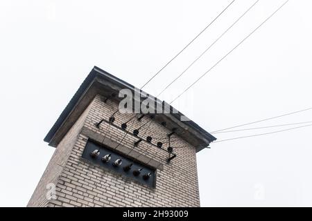 Old transformer booth, power connection and energy volt box. Stock Photo