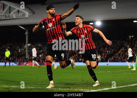 London, UK. 03rd Dec, 2021. Dominic Solanke of Bournemouth (l) celebrates scoring his teams first goal. EFL Skybet Championship match, Fulham v AFC Bournemouth at Craven Cottage in London on Friday 3rd December 2021. this image may only be used for Editorial purposes. Editorial use only, license required for commercial use. No use in betting, games or a single club/league/player publications. pic by Steffan Bowen/Andrew Orchard sports photography/Alamy Live news Credit: Andrew Orchard sports photography/Alamy Live News Stock Photo