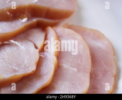 Fillets of smoked turkey close up. Stock Photo