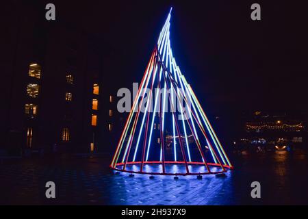 London, UK. 3rd December 2021. A new winter installation entitled Temenos by artist Liliane Lijn has been unveiled at Granary Square in King's Cross. The 11.3-metre structure will be on display until February 2022. Credit: Vuk Valcic / Alamy Live News Stock Photo