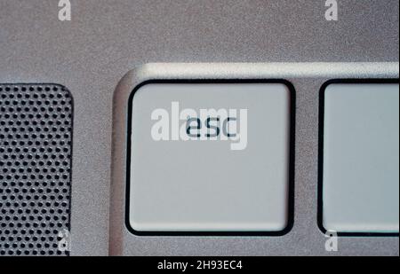 Detail of a laptop keyboard focused on the escape key Stock Photo