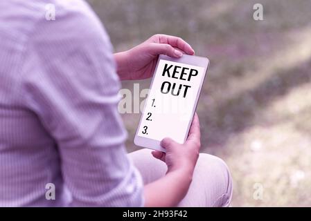 Conceptual display Keep Out. Business idea to stop someone or something from going into a place Danger sign Online Jobs And Working Remotely Stock Photo