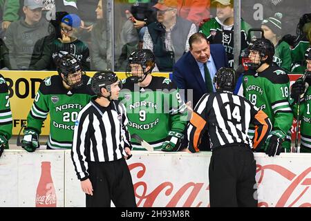 St Cloud, USA. 03rd Dec, 2021. North Dakota Fighting Hawks head coach Brad Berry speaks with officials during a NCAA men's hockey game between the University of North Dakota Fighting Hawks and the St. Cloud State University Huskies at Herb Brooks National Hockey Center in St. Cloud, MN on Friday, December 3, 2021. By Russell Hons/CSM Credit: Cal Sport Media/Alamy Live News Stock Photo