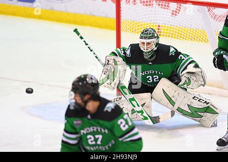 St Cloud, USA. 03rd Dec, 2021. North Dakota Fighting Hawks goaltender Jakob Hellsten (32) watches and incoming shot during a NCAA men's hockey game between the University of North Dakota Fighting Hawks and the St. Cloud State University Huskies at Herb Brooks National Hockey Center in St. Cloud, MN on Friday, December 3, 2021. By Russell Hons/CSM Credit: Cal Sport Media/Alamy Live News Stock Photo