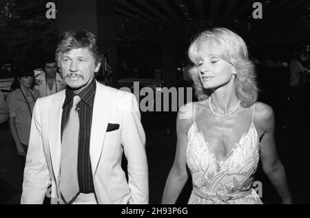 Charles Bronson and Jill Ireland  at the wedding reception for producer Al Ruddy and newspaper columnist Wanda McDaniel on June 21, 1981. Credit: Ralph Dominguez/MediaPunch Stock Photo