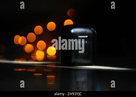 earbuds image in night BG Stock Photo