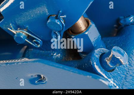 close-up view on hydraulic valve and piston of floor car jack Stock Photo
