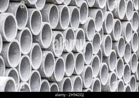 Closeup of asbestos pipes on construction site. Stock Photo