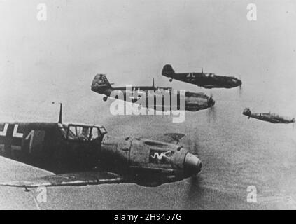 ENGLAND - Summer 1940 - Luftwaffe Messerschmitt BF-109 fighters flying in formation somewhere over England during the Battle of Britain - Photo: Geopi Stock Photo