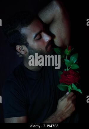 a boy with rose image hd Stock Photo