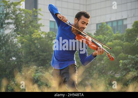 violin player images . Music and musical tone concept. images of man musician Stock Photo