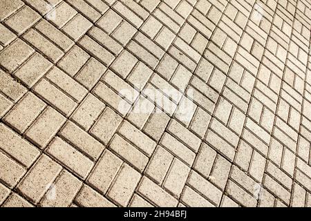 Diagonal view of pavement with geometric stone layer. Stock Photo
