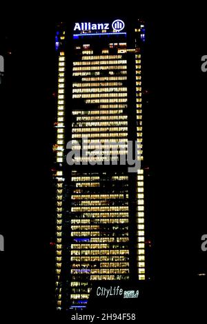 The tower skyscraper built in 2020 in Milan CityLife district area called Isozaki Tower (Allianz) seen from the MiCo Convention centre in a night view Stock Photo