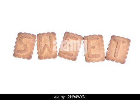 On white clipping background word SWEET laid out from cookies in center of frame Stock Photo