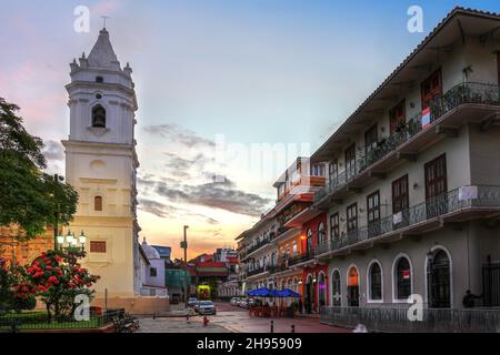 Beautiful sunset in Casco Antiguo Square with old houses and the Panama Metropolitan Cathedral, Santa Maria La Antigua. Stock Photo