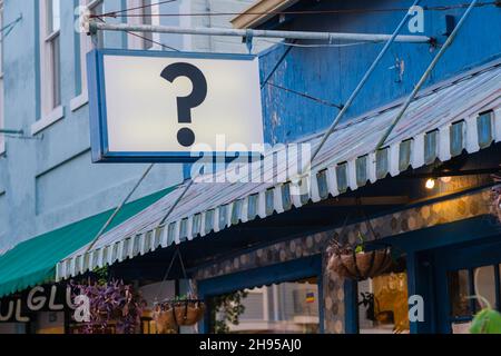 NEW ORLEANS, LA - OCTOBER 19, 2020: Question Mark Sign at Storefront on Oak Street