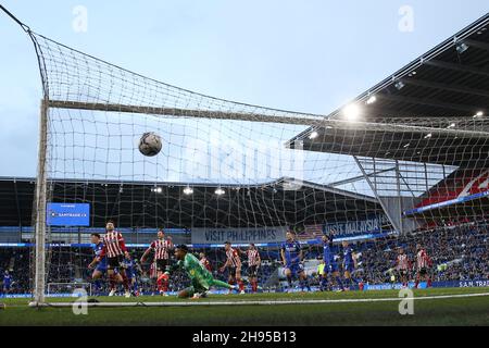 Cardiff, UK. 04th Dec, 2021. Mark Harris of Cardiff city scores his teams 1st goal. EFL Skybet championship match, Cardiff city v Sheffield United at the Cardiff City Stadium in Cardiff, Wales on Saturday 4th December 2021. this image may only be used for Editorial purposes. Editorial use only, license required for commercial use. No use in betting, games or a single club/league/player publications. pic by Andrew Orchard/Andrew Orchard sports photography/Alamy Live news Credit: Andrew Orchard sports photography/Alamy Live News