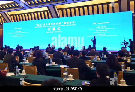 Beijing, China. 4th Dec, 2021. Photo taken on Dec. 4, 2021 shows the opening ceremony of the International Forum on Democracy: the Shared Human Value, in Beijing, capital of China. Credit: Chen Yehua/Xinhua/Alamy Live News Stock Photo