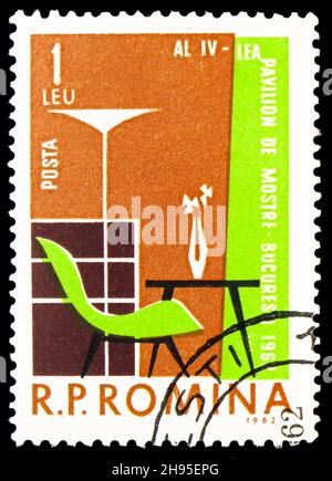 MOSCOW, RUSSIA - OCTOBER 24, 2021: Postage stamp printed in Romania shows Household furniture : chair, table, lamp and cabinet, 4th Sample Fair, Bucha Stock Photo